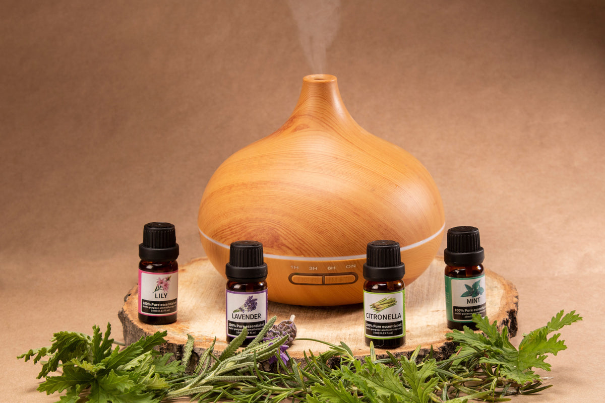 Wooden essential oil diffuser with lavender, lily, citronella and mint essential oils